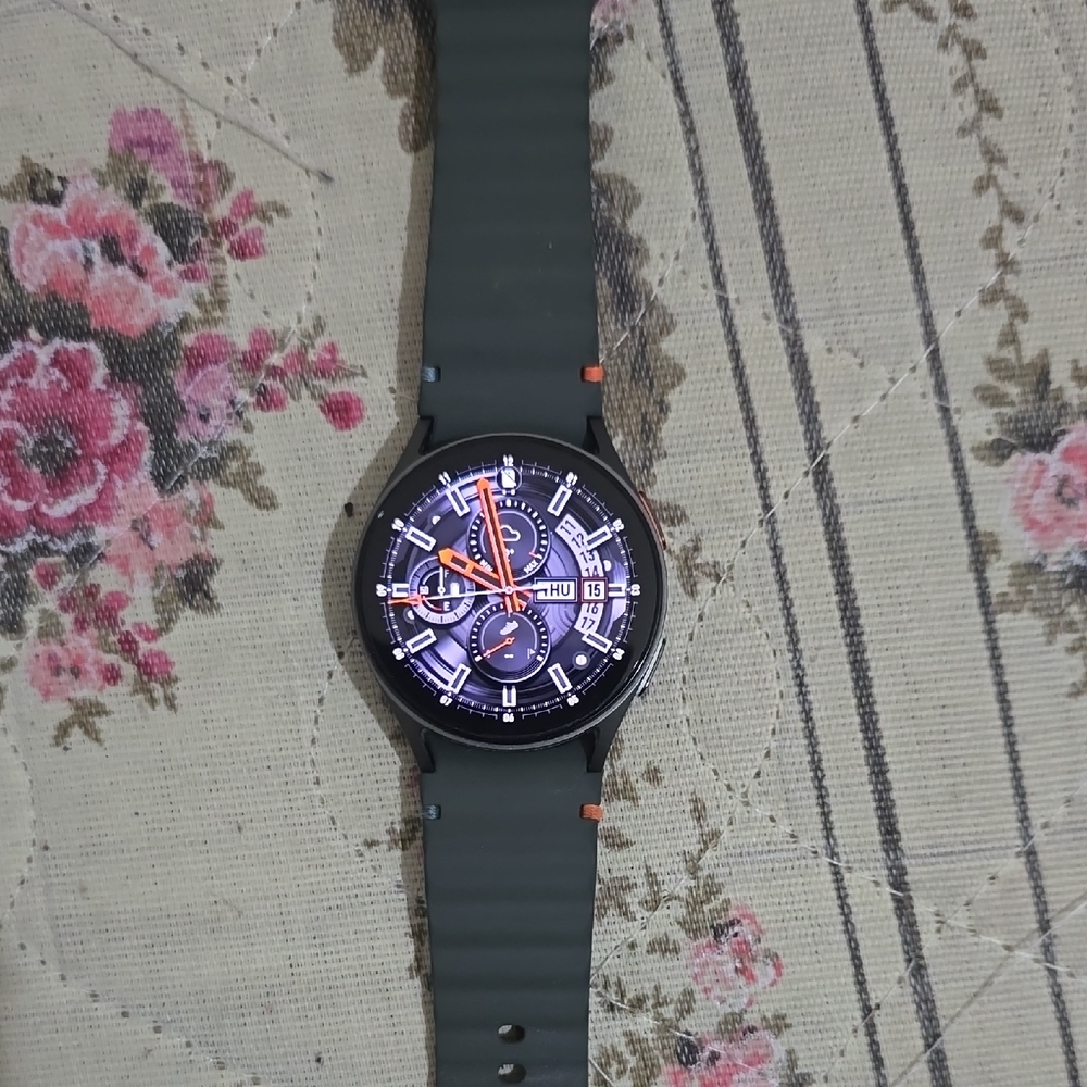 Samsung Smartwatch with Green Strap and Black Bezel